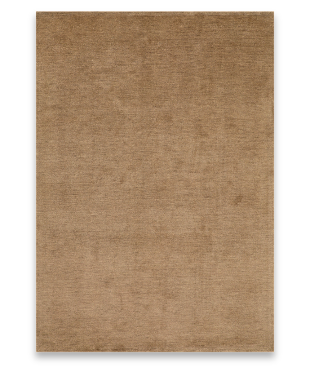 Ecru plain handloom wool carpet in camel