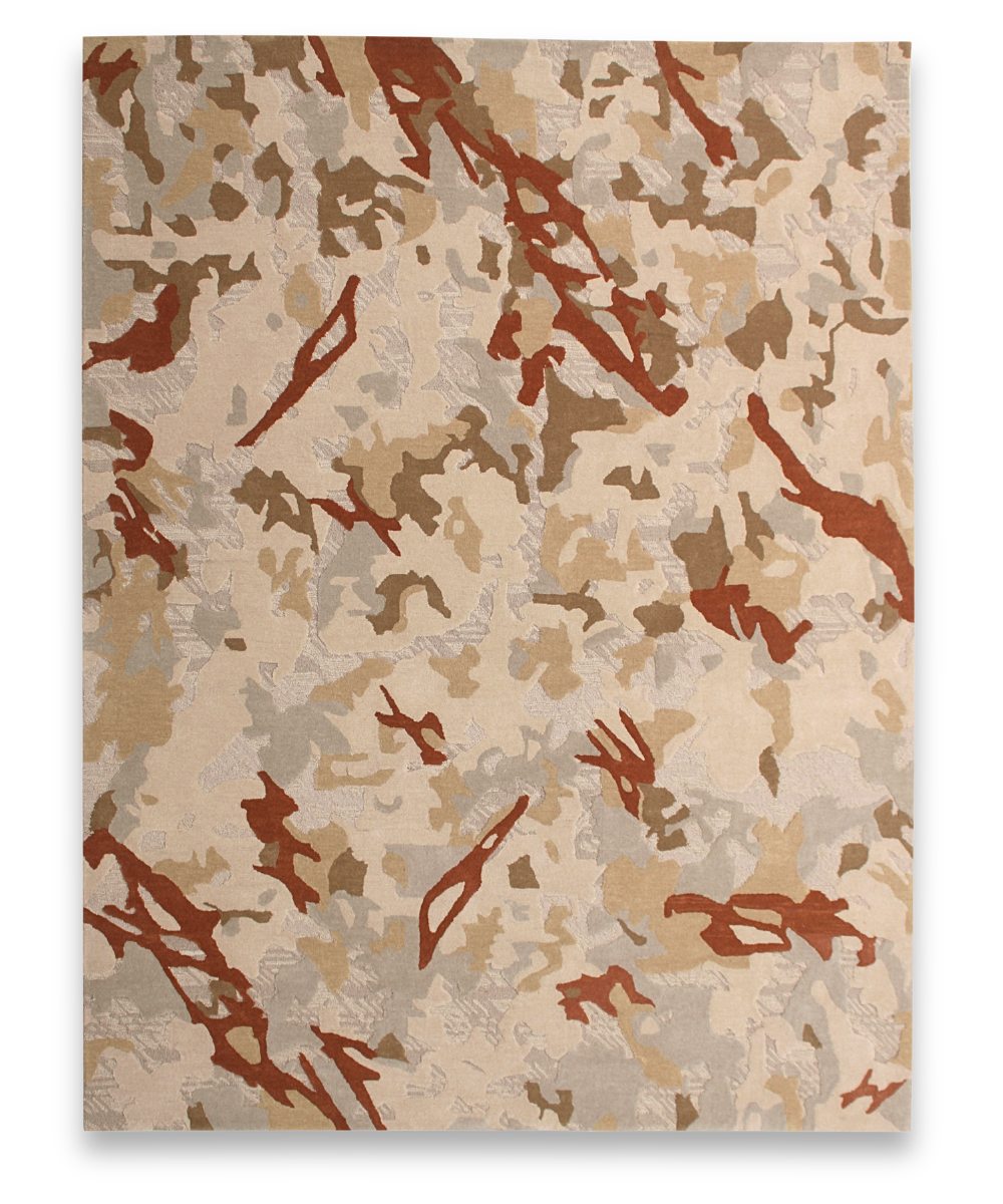 Camo hand tufted wool carpet with sand camouflage and rust red strokes
