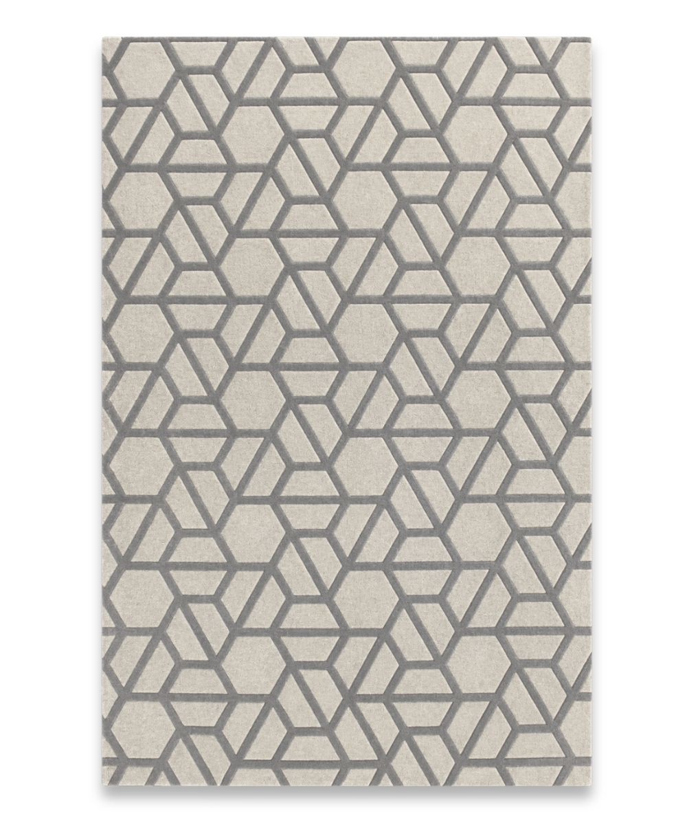 Hive hand tufted New Zealand wool carpet with grey hexagon lattice on stone